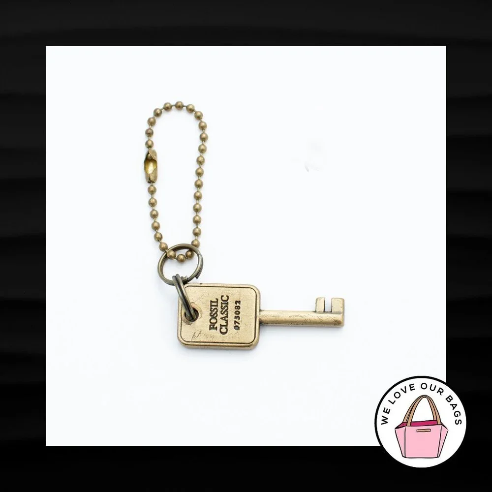 FOSSIL GOLD BRASS METAL KEY SHAPED CHARM on BALLCHAIN FOB BAG KEYCHAIN HANG TAG